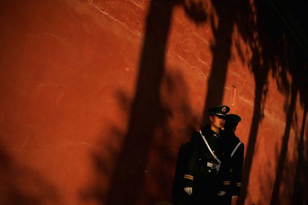 Policemen outside the Great Hall of the People in Beijing on Nov. 12, 2013.<br/>(Photo by Feng Li/Getty Images)